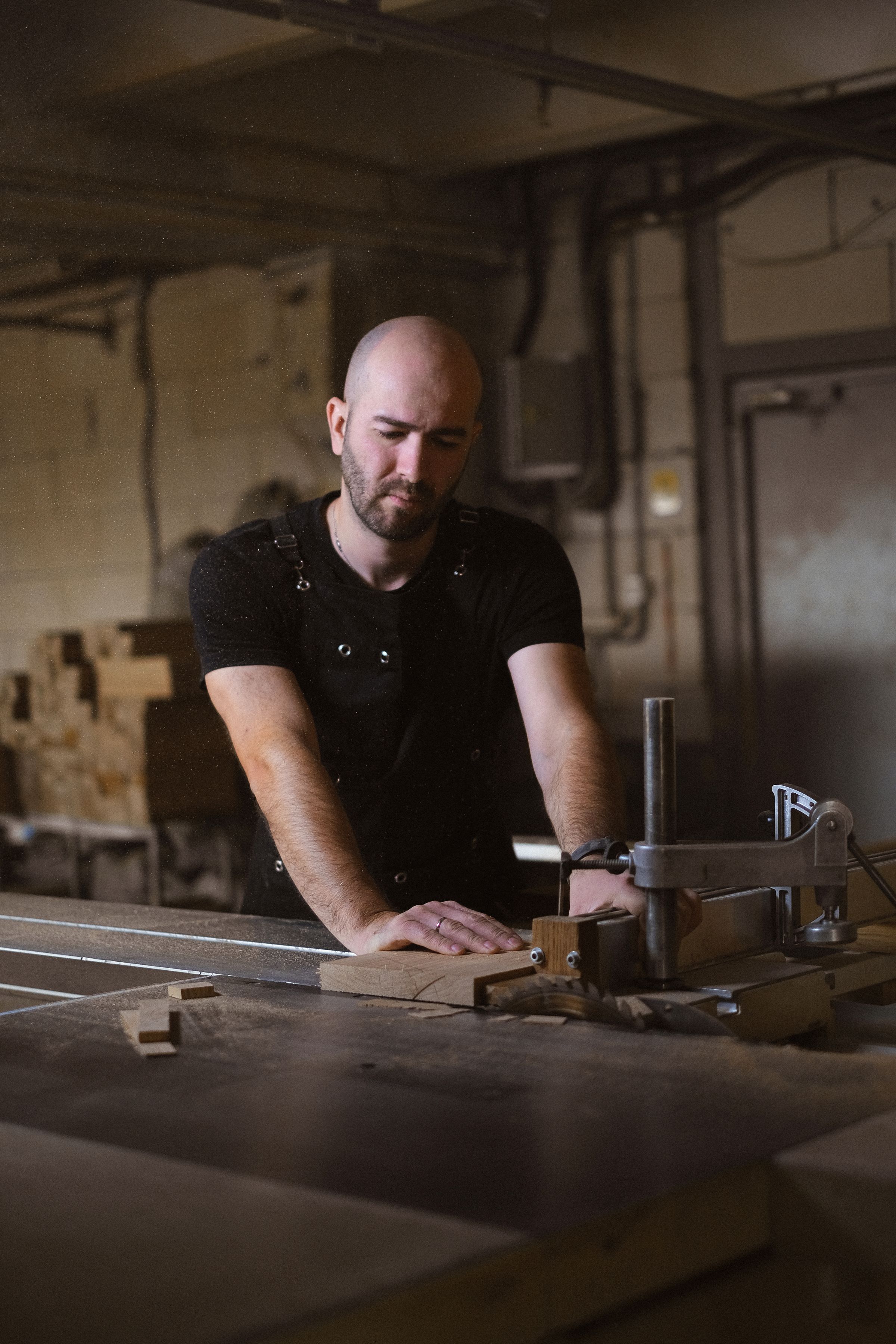 Craftsman detailing custom cabinetry during a remodeling project